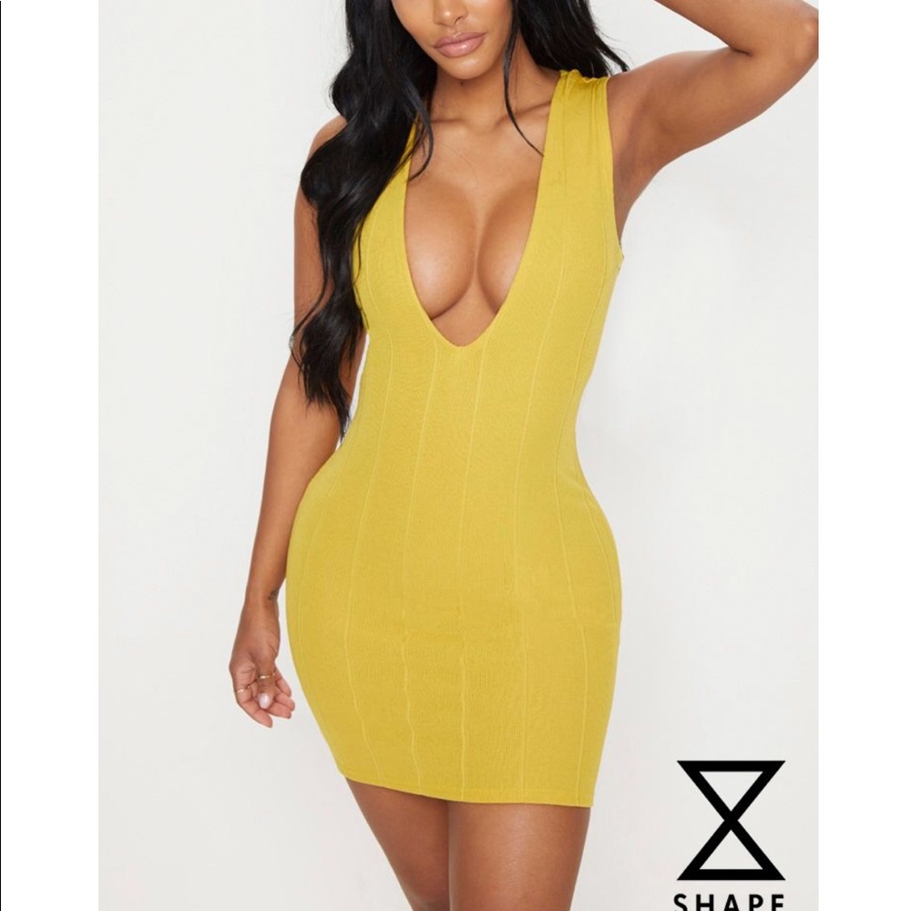 mustard bandage dress from Pretty Little Thing